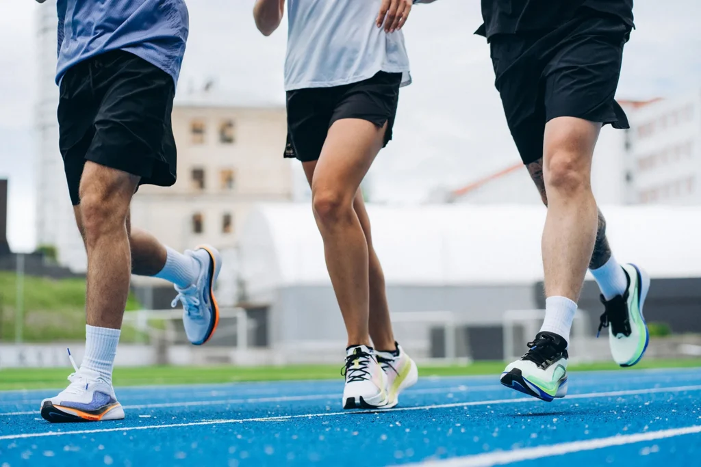 close up of runners feet training on outdoor